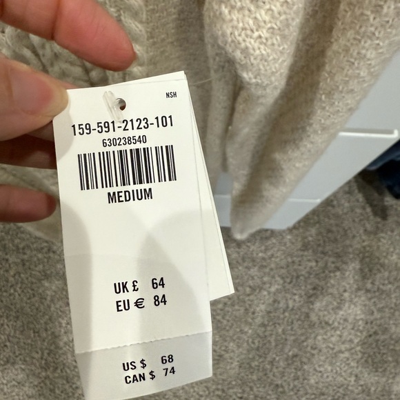 Abercrombie & Fitch Mock Neck Cream
Cable Knit Sweater Dress - Picture 4 of 6